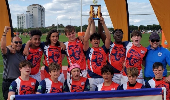 The Panther Rugby Academy U14 Boys celebrate their Tropical 7s win.