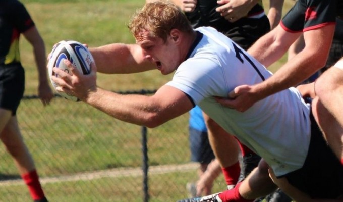 Queens University scoring a try.