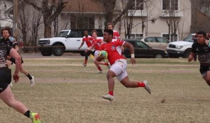 Regis Jesuit in red and Palmer in black. Photos Regis Jesuit Rugby.