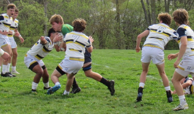 Sean Neier busting through for Royal Irish. Alex Goff photo.