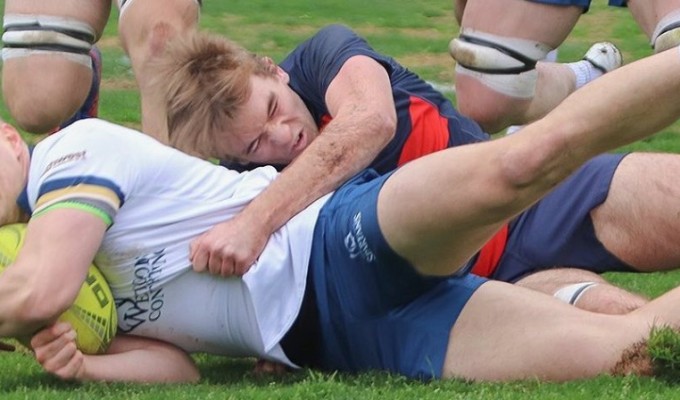 Tackle time Saint Mary's vs Trinity Western. Photo courtesy Saint Mary's College Rugby.