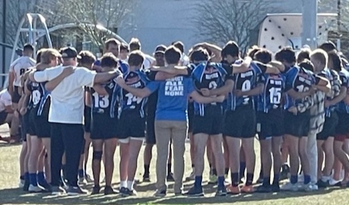 The SOC Raptors huddle up.