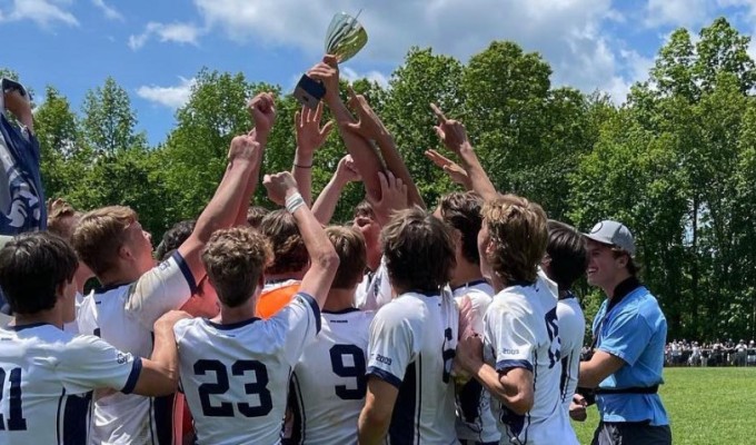 The Hermits raise the trophy. Photo Rugby New Jersey.