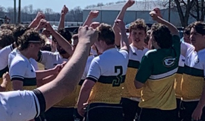 St. Edward huddles up post-match.