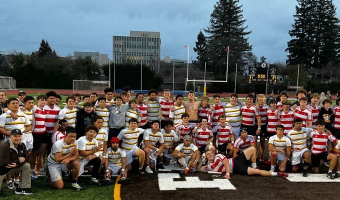 St. Francis and Jesuit players pose together after their game.