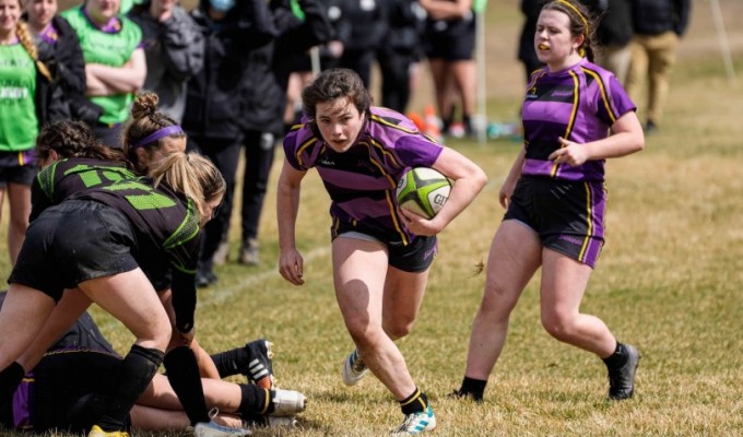 Maggie Sweeney has her eyes on the tryline for St. Joseph Academy. Photo St. Joseph Rugby.