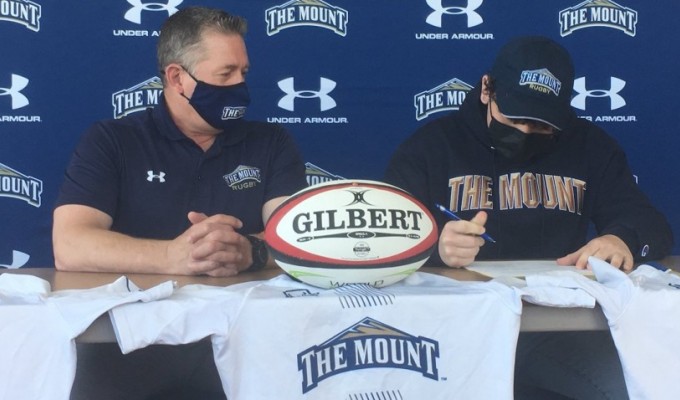 James Stelluti signs with Mount St. Mary's.