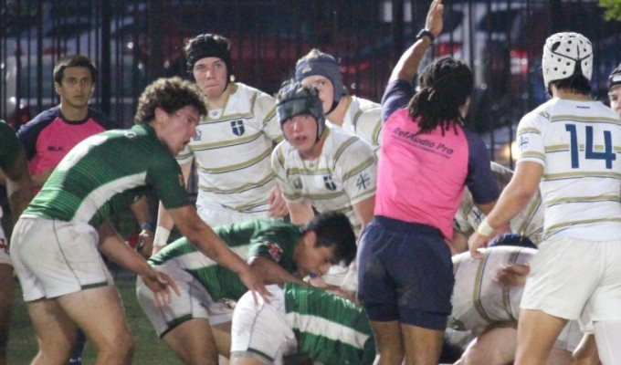 Strake and Dallas players try to figure out the referee's call in their March clash. Chris Couch photo.