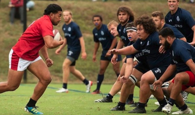 Southern Virginia, in red, came back to beat Queens, in blue, October 2019. Photo SVU Athletics.