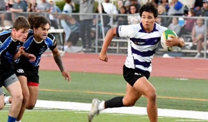 Andrew Hernandez on his way to one of his tries.