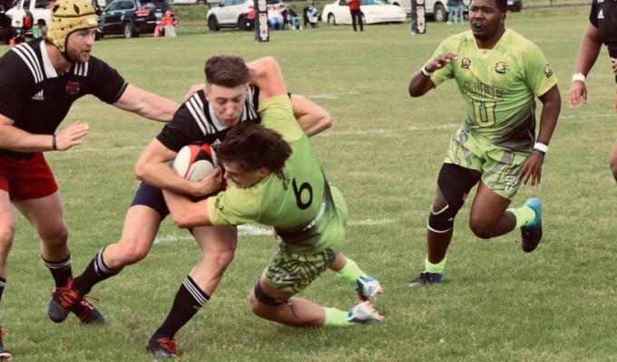 TJ van Rensburg gets some attention from the Life University defense. Photo ASU Rugby.