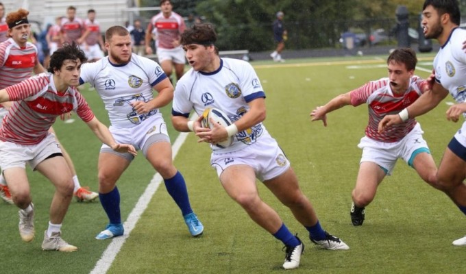 Tomasso Lorenzetti finds some space. Photo Marian University Rugby.