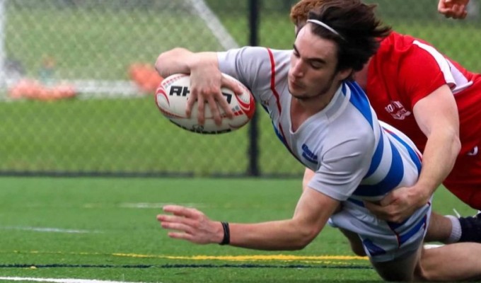 Jon Brabo scoring for UMass Lowell. Photo Denis Sweeny.