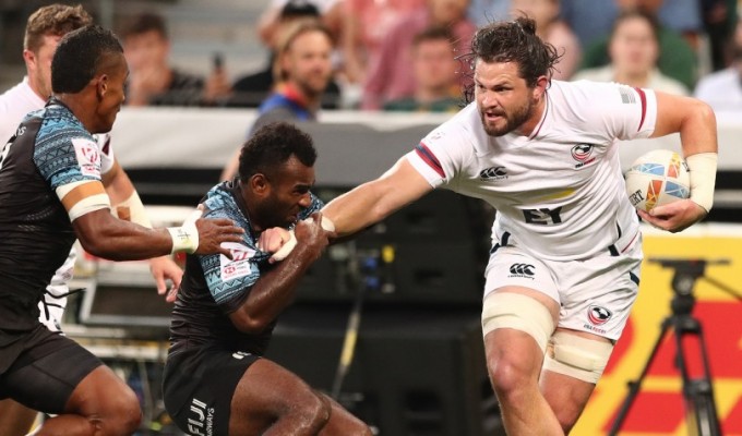 Danny Barrett gets some attention from the FIjian team. Mike Lee KLC fotos for World Rugby.