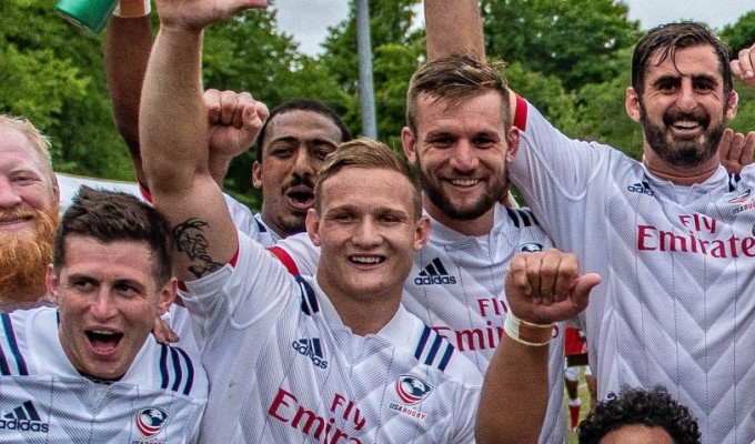 Eric Fry, far left, a Nick Civetta, far right, celebrate with the USA team after beating Canada in 2018. Colleen McCloskey photo