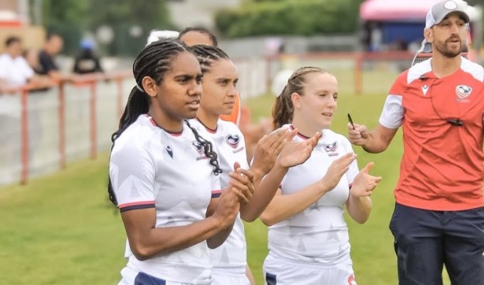 Zack Test and Falcons players on the sideline during the EAAST 7s.