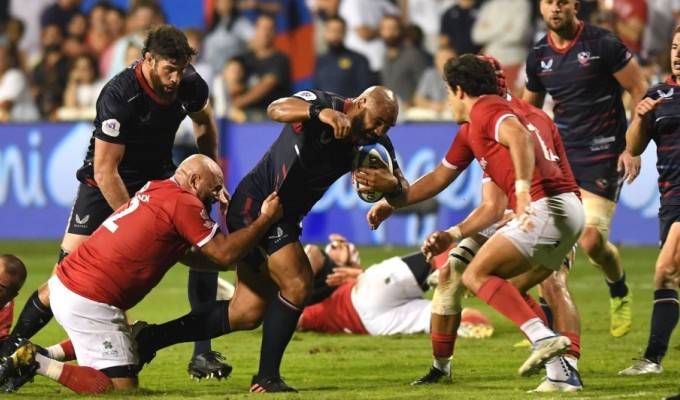 Paul Lasike tries to find some space. Photo by Martin Dokoupil - World Rugby/World Rugby via Getty Images.