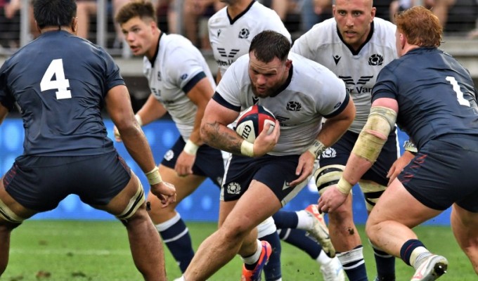 Vili Helu, left #4, and Jack Oscar, right #1, work to make a tackle against Scotland last summer. Both return to the USA roster.