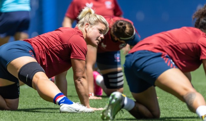USA players stretching it out. Everyone shows up to the assembly expected to know the details. Alex Ho photo.