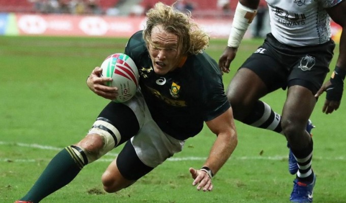 South Africa's Werner Kok scores a try against Fiji in Singapore. Mike Lee - KLC fotos for World Rugby