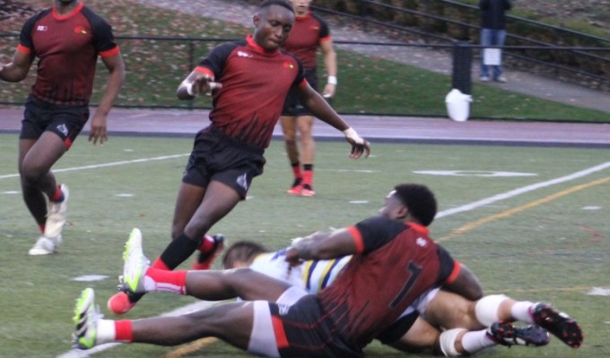 Aaron Juma makes a tackle for Wheeling. Alex Goff photo.