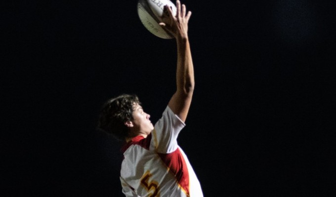 Will Boyer goes up for a lineout ball for Cathedral.