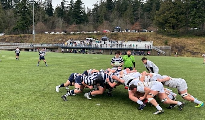 WWU (in stripes) packs down against Trinity Western.