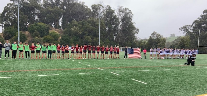 Jesut at left, and St. Augustine, at right, line up for the anthem before the game. Jesut at left, and St. Augustine, at right, line up for the anthem before the game.