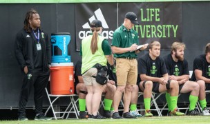 Colton Cariaga checking his notes during the D1A final. David Barpal photo.