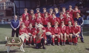 The 1991 USA Women try not to be upstaged by a goat.
