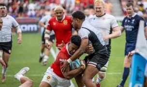 Canada in white vs Tonga red. Photo World Rugby.