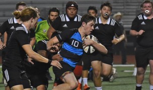 Alta Vista HS in black versus Jaguars in blue. Photo: Rogers Photography. 