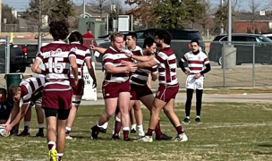 A&M players congratulate Ryan Meehan, who scored twice for the Aggies.