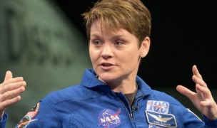 Anne McClain answers a question during a NASA presentation. Photo NASA.