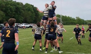 Royal Irish in blue and Dwenger in stripes contest the lineout.