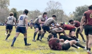 Brother Martin, in red, battles Jesuit New Orleans in the breakdown. photo Beckham Ayo.