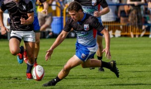 Brett Dowgiewicz chases down the ball playing for the NA Lions.