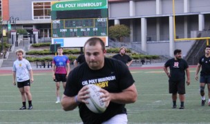 Logan Zampa takes the ball up during training. Alex Goff photo.