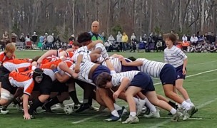 Scrum time. See all the fans. It was a popular place. Alex Goff photo.