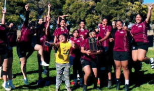 All smiles as Carson celebrates their championship.