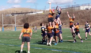 Charlotte goes up for a lineout vs St. Ignatius. Alex Goff photo.