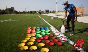 Maks up and spray 'em down. Photo courtesy Chicago Lions.