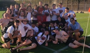 The Central Washington team gathers all smiles after the win.