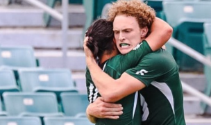 Frohlich and Weir hug it out. Photo NCR.