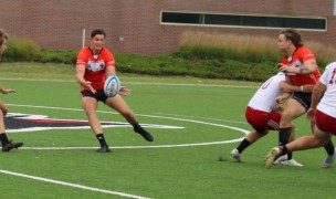 Davenport flyhalf Sean Nolan sets up teammate Ethan Howard September 17 vs Indiana. Alex Goff photo.