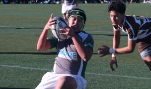 Xavier Ordoniez chases down a grubber to score for De La Salle. Photo Krista McCabe.