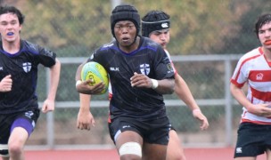 Egya Reddy charges ahead for St. Augustine. Bill Strack photo.