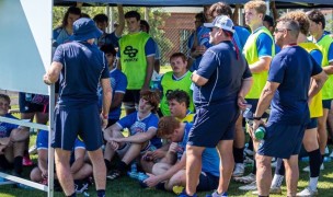 The EIRA players and coaches during game prep this week.