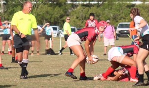 Brianna Beath sends the ball out against Atlantis.