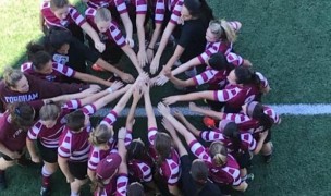 Fordham women huddle.